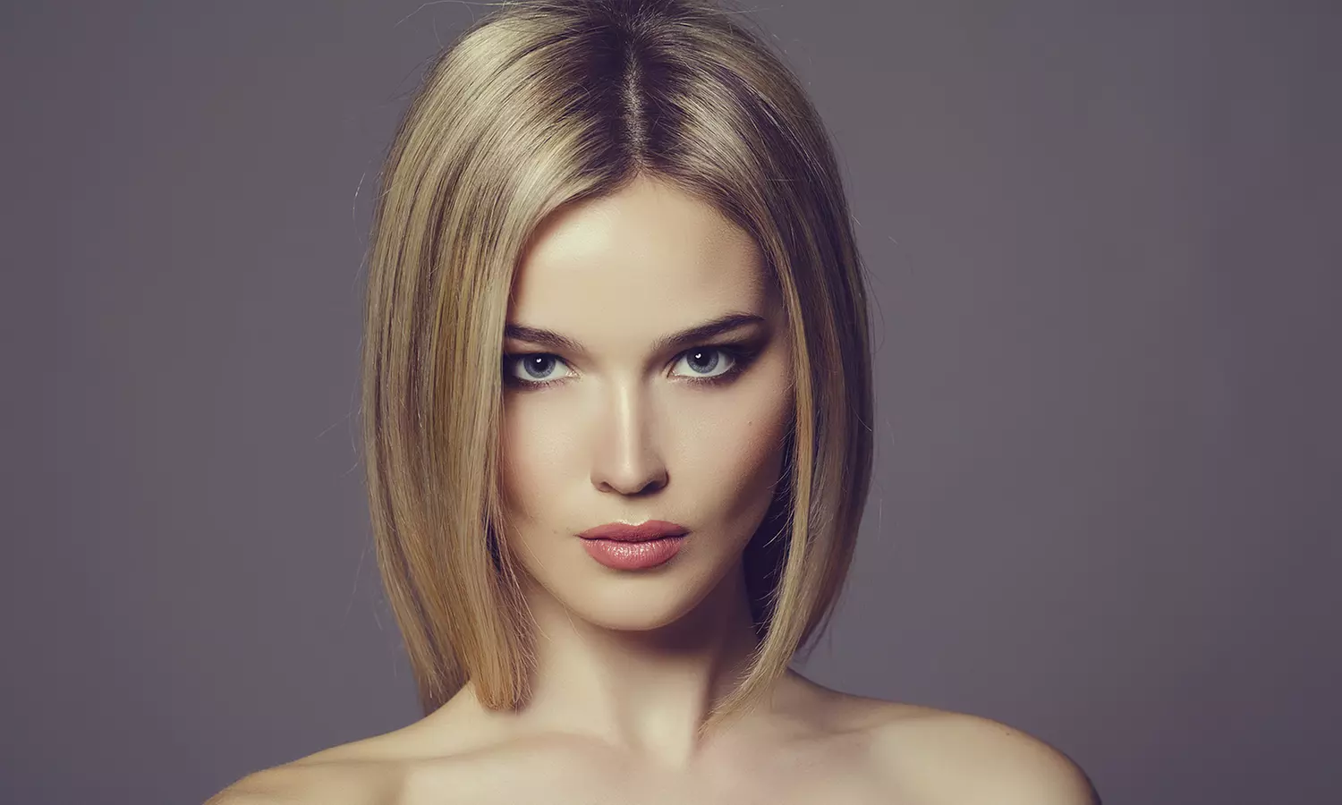 $45 for Haircut, Mini Partial Highlights, Brow Shaping, and Hand Massage at Bombshell Salon ($90 Value) - Primary Image