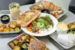Enjoy a Signature Meal For One or $25 Credit Toward Any Breakfast at HEYDAY EATERY (Up to 33% Off) - Second Medium