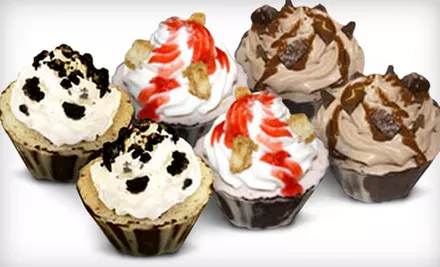 One Small Log Ice Cream Cake or One Box of Blizzard Cupcakes at Dairy Queen (Up to Half Off) - Primary Image