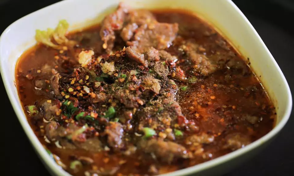 Indulge in a 7-Course Peking Duck Feast for Two at Lao Sze Chuan