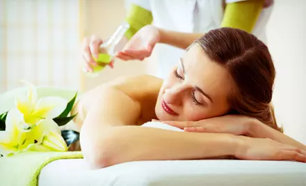 Hot-Oil Massage with Exfoliation and Facial, or Facial with Back Exfoliation at Atlantis Beauty Spa (Up to Half Off) - Primary Image