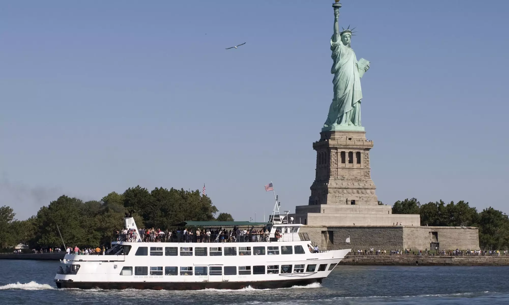 NYC Skyline & Sunset: 4-Hour Statue of Liberty Sunset Cruise for One, Two or Four People - Primary Image