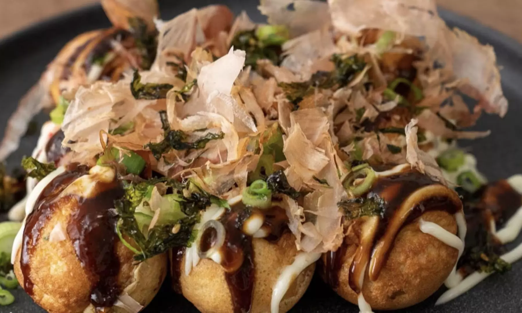 Savor Bao Buns, Sides, and Drinks for up to Four!