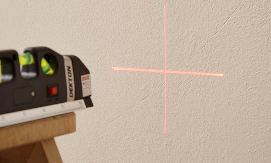 Image 8: Laser Level and Tape Measure
