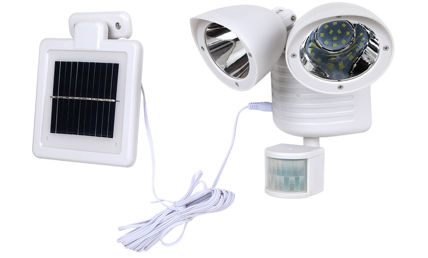 Image 9: Solar-Powered Twin Head LED Light