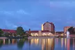 One- or Two-Night St. Louis Mardi Gras Weekend Package with Breakfast, Beads, Drink Tickets, and Late Check-Out - Second Medium