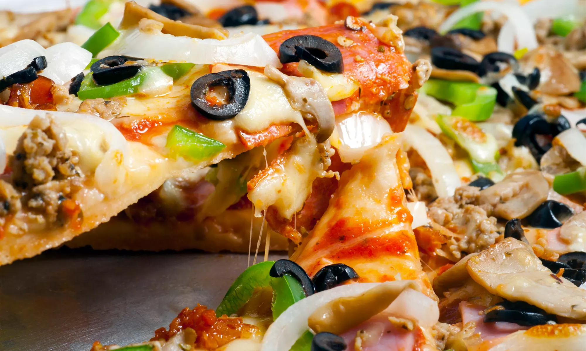 $22 for Two Groupons, Each Good for One Large Pizza with Up to Seven Toppings at Papa John's (Up to $43.64 Value) - Primary Image