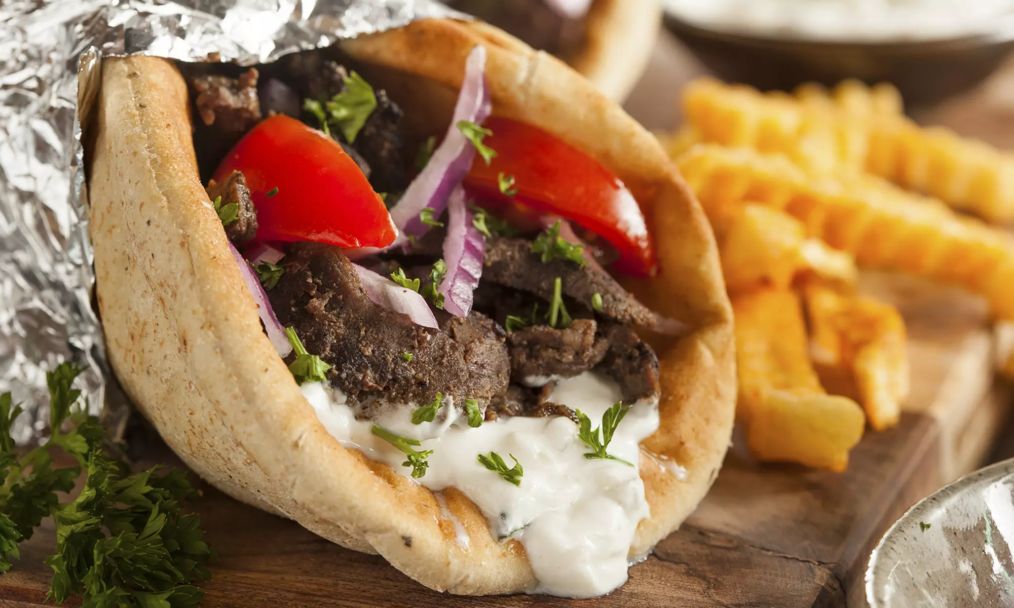 Greek and American Food for Dine-In or Takeout at Athena's Grill (Up to 44% Off) - Primary Image