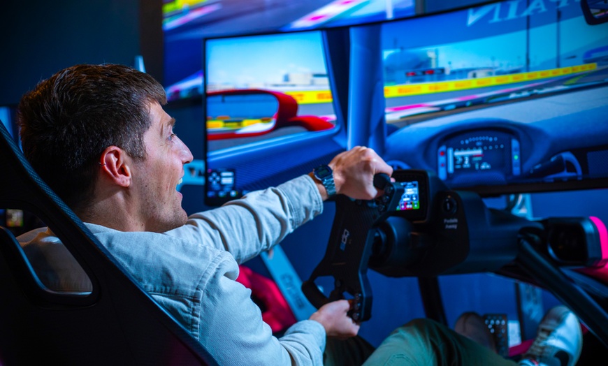 Image 1: Enjoy 30-Min Driving Simulator For One, Two or Four with Drink Options