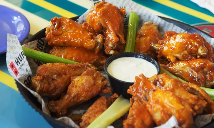 Summer Lunch Special for four or Wingman Dinner Meal at Hurricane Grill & Wings (Up to 42% Off)  - Primary Image