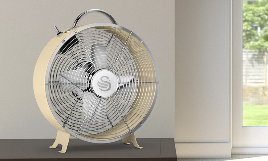 Image 5: Swan Clock Fan