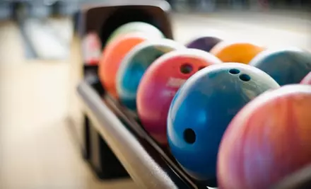 $25 for Bowling for Four with Shoe Rental, Large Pizza, and $10 Worth of Arcade Games at Sunset Lanes (Up to $63.79 Value) - Primary Image