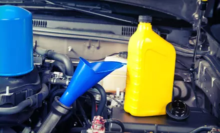Oil Changes and Tire Services at Scott's U-Save (Up to 60% Off). Three Options Available. - Primary Image