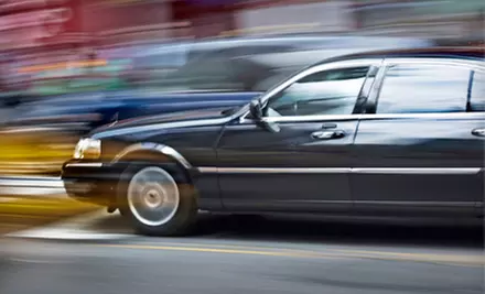 One-Way Transportation to LaGuardia, JFK, or Newark Airport in a Lincoln Town Car from CNH Limousine (Up to 83% Off) - Primary Image