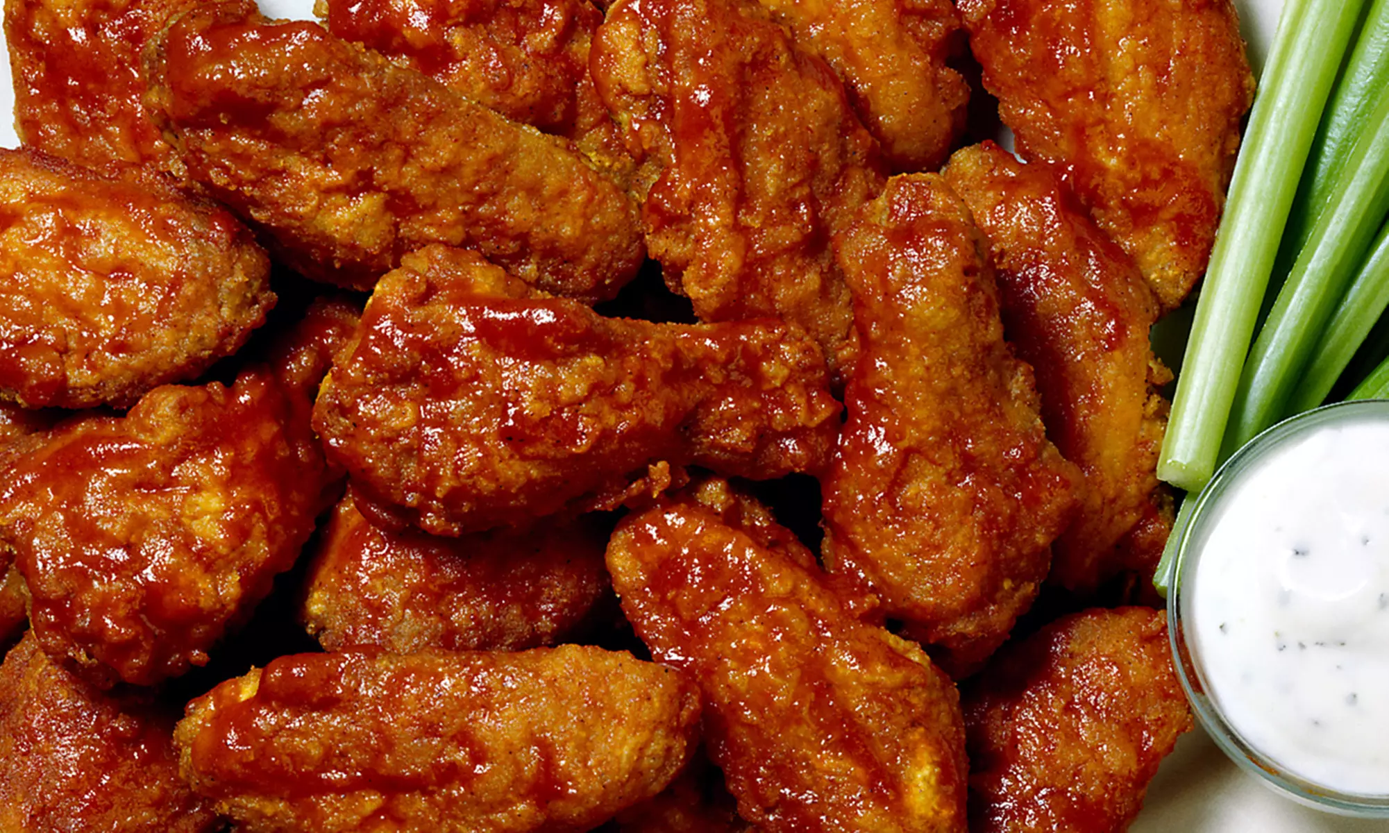 C$15 for 1 Pound of Wings and One Pitcher of Beer at Curly Portable's (C$28.11 Value) - Primary Image
