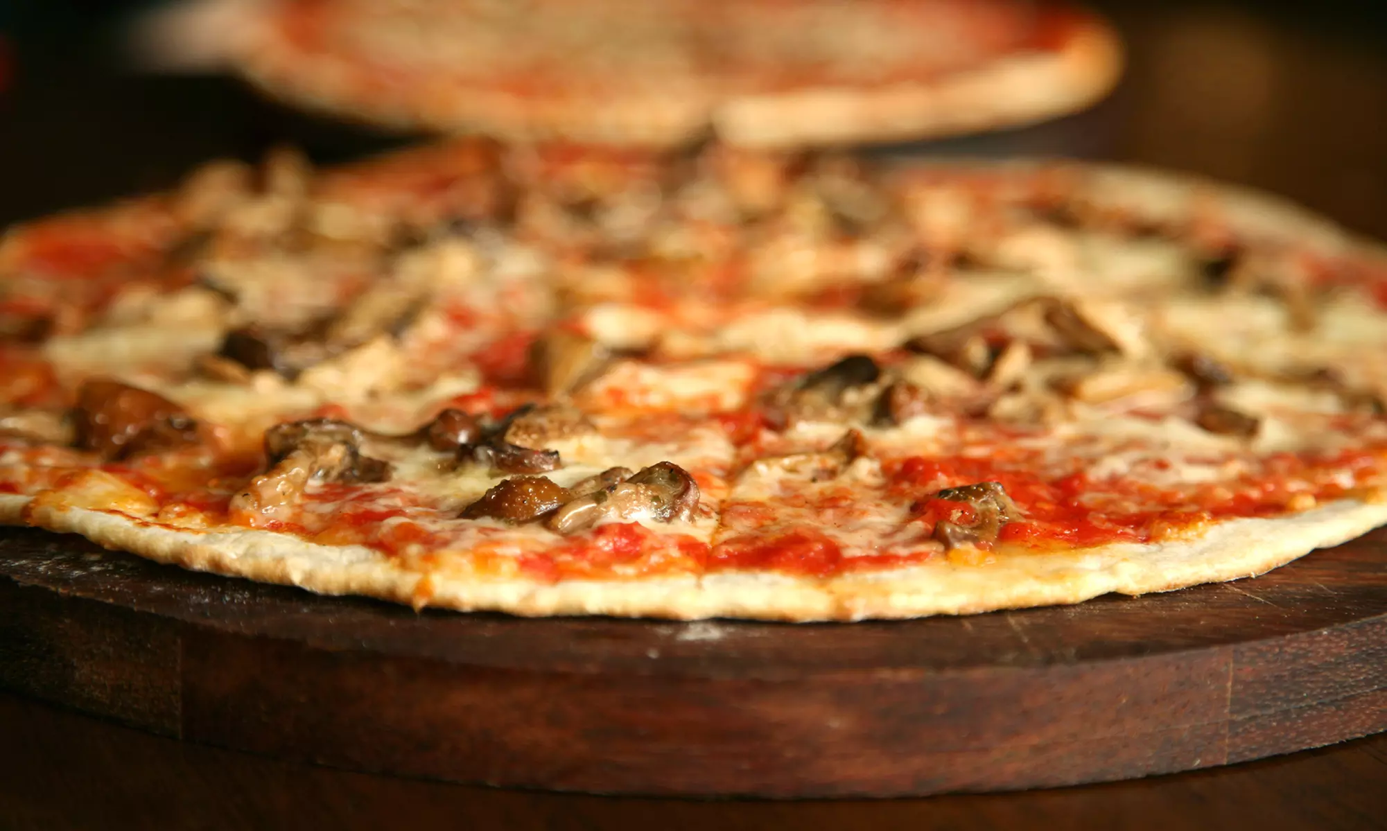 Pizza Packages with Options for Soda, Subs, and Salad at Taranto's Pizza (Up to 43% Off). Four Options Available. - Primary Image