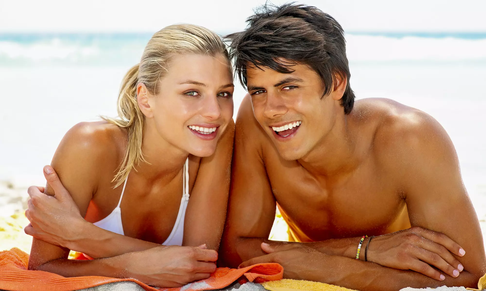 Five UV-Tan Sessions in Five Levels of Beds or One VersaSpa or Norvell Spray Tan at Darque Tan (Up to 83% Off) - Primary Image