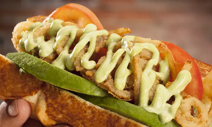 Sausages, Hot Dogs, and Burgers for Two or Four at Dog Haus (Up to 38% Off) - Primary Image