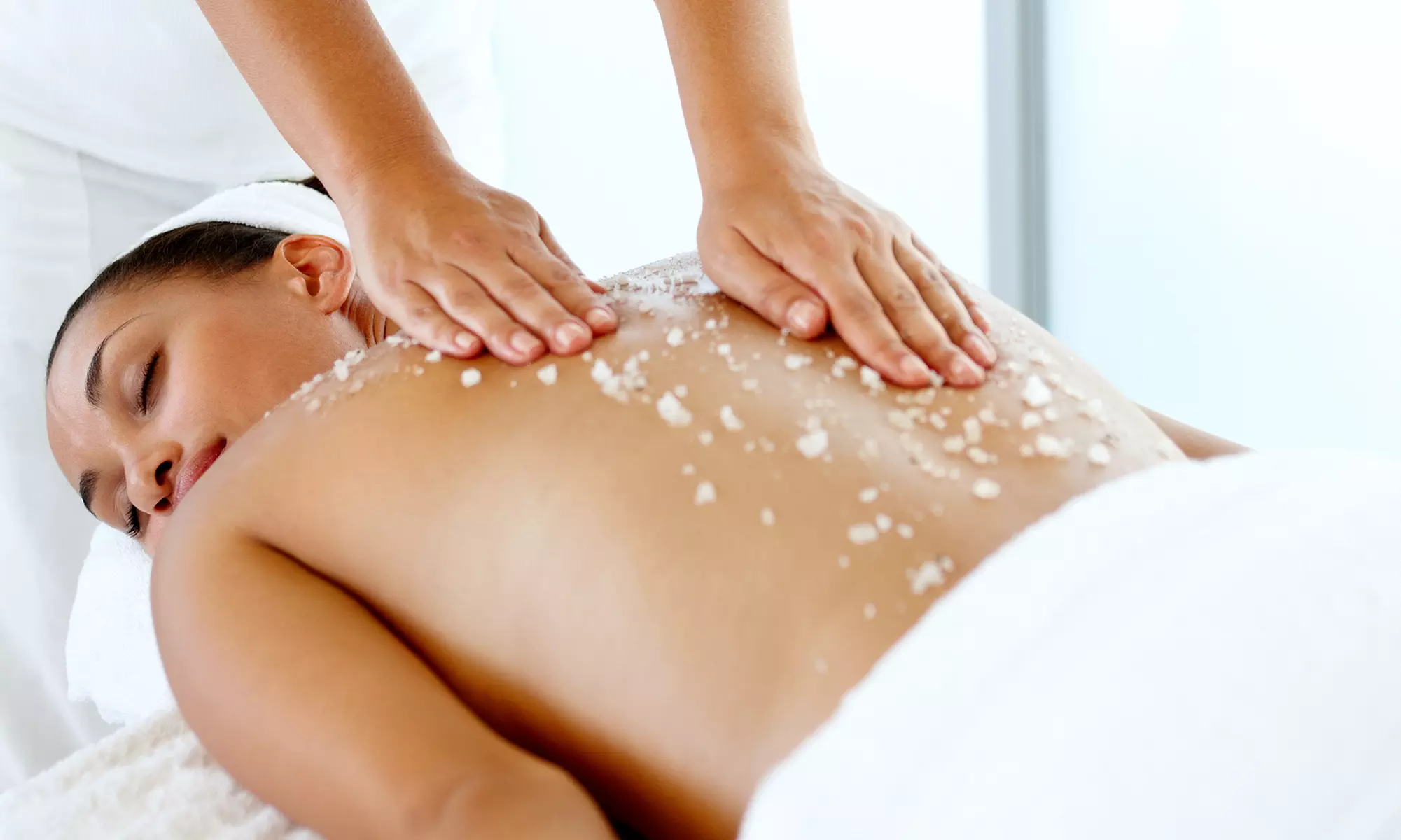 One, Two, or Three 60-Minute Body-Glow Scrubs with Massages at mojo day spa (Up to 53% Off) - Primary Image