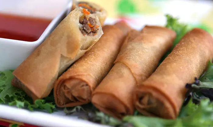 Two or Three Groupons, Each Good for $16 Worth of Guamanian Cuisine and Drinks at Guahan Grill (50% Off) - Primary Image