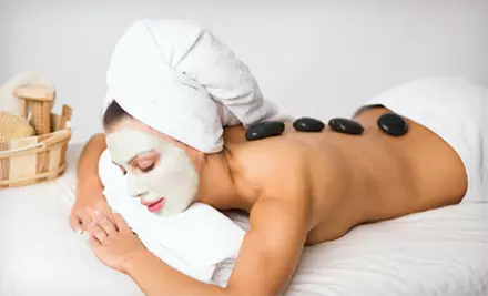 Facial with Warm-Stone Massage or 30-, 45-, or 60-Minute Warm-Stone Massage at Devine Esthetics (Up to 54% Off) - Primary Image
