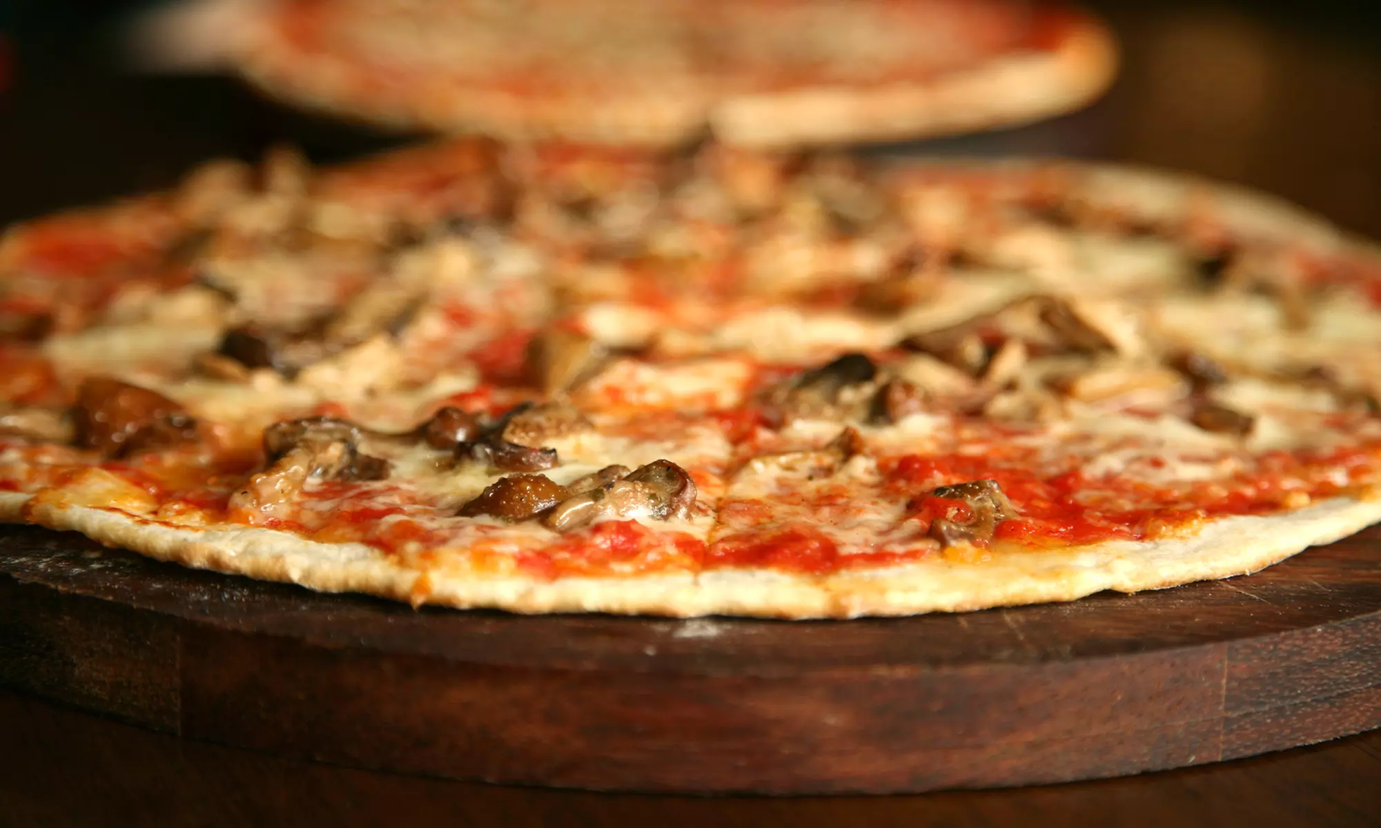 Pizzeria Food at Taranto's Pizza (Up to 44% Off). Four Options Available. - Primary Image
