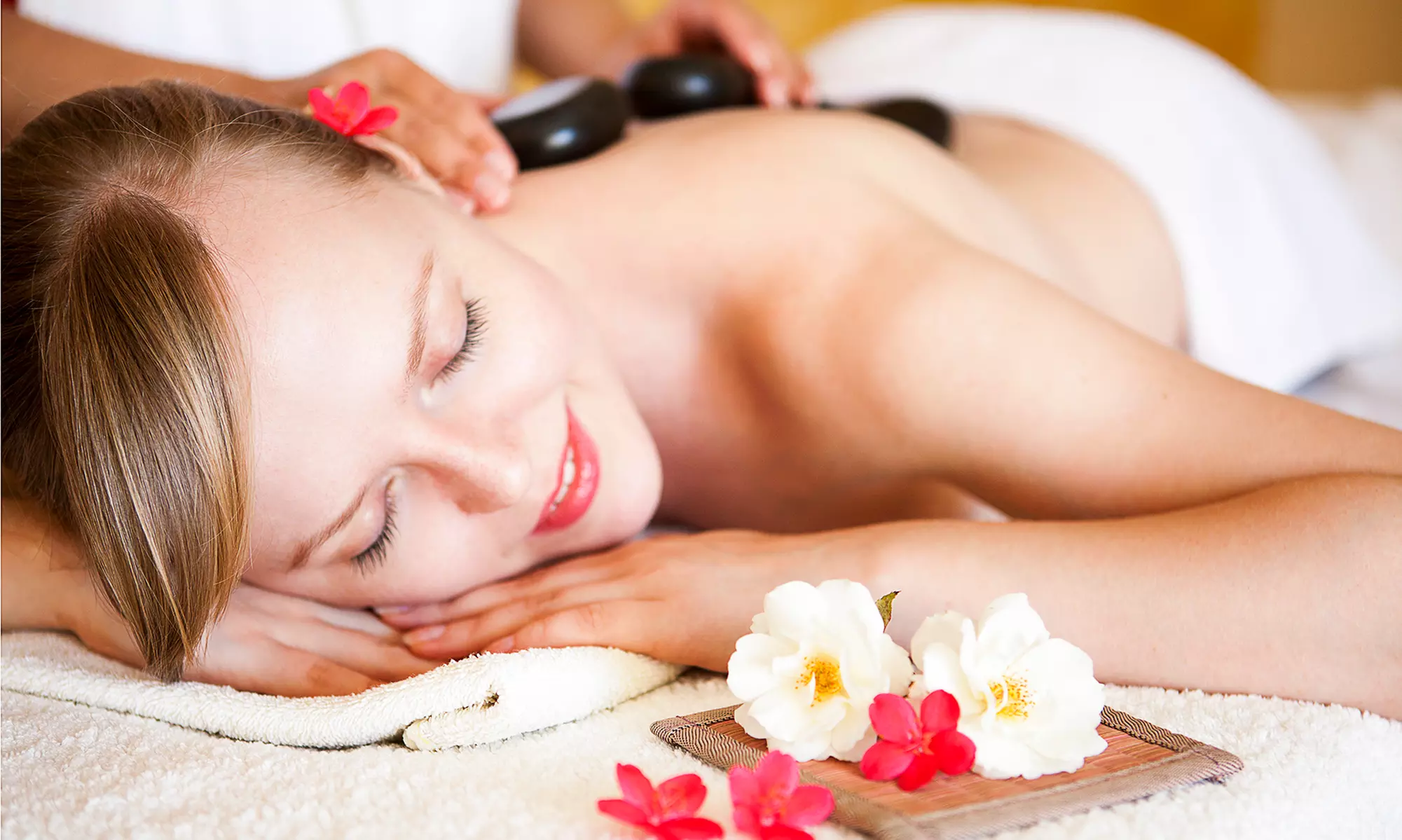 60-Minute Deep-Tissue or Sports Massage, or 90-Minute Hot-Stone Massage at Touch of Tranquility (Up to 53% Off) - Primary Image