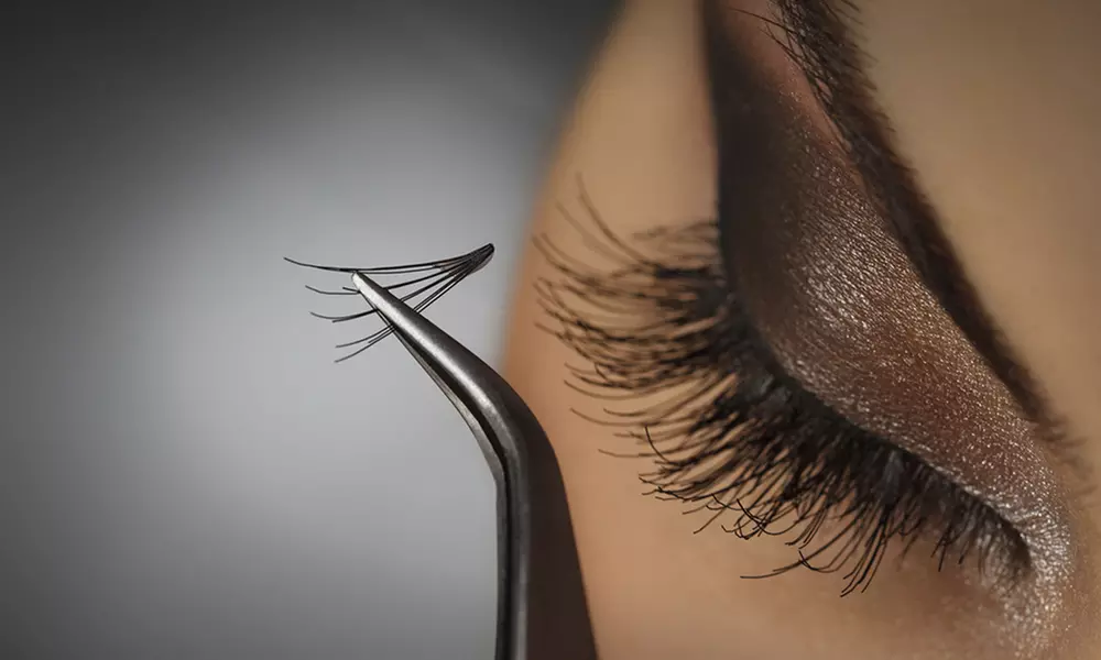 Experience the beauty of Royal Threading Center's individual eyelash extensions, offering up to 64% off for full, lush lashes - Primary Image
