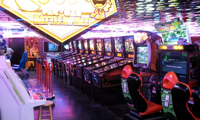 Two vouchers, Each Good for 120 Tokens During One Arcade Visit at Family Arcade (36% Off) - Primary Image