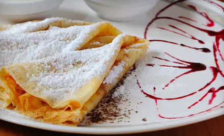 Sweet and Savory Beignets and Cornbread Crepes at Beignet (Half Off). Two Options Available.  - Primary Image
