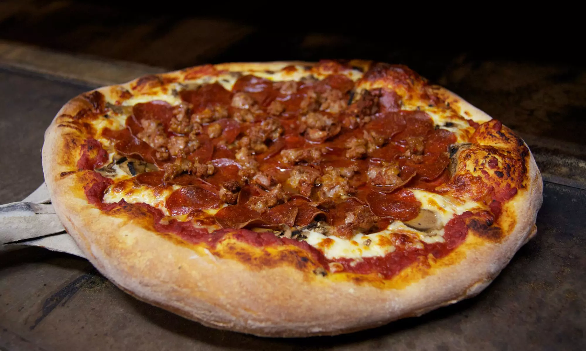 Pizza for Dine-In or Takeout at Roma's Pizza and Pasta (Up to 20% Off). Two Options Available. - Primary Image