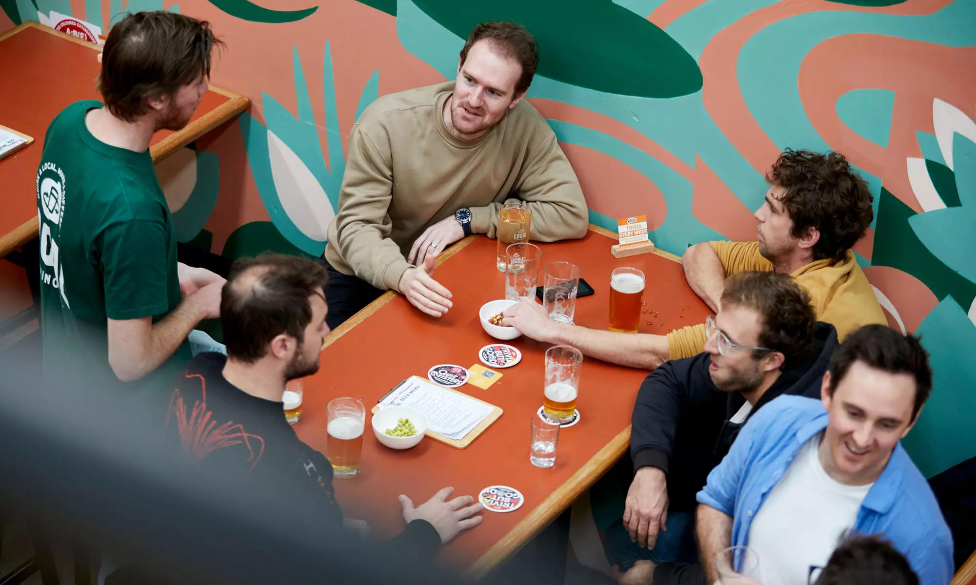 Enjoy a pizza and pint with sides for Two or Four at Local Brewing Co