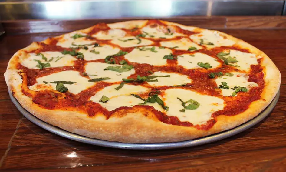 $12 for $20 Worth of New York–Style Pizza, Wings, and Garlic Knots at Este Pizza Sugar House - Primary Image