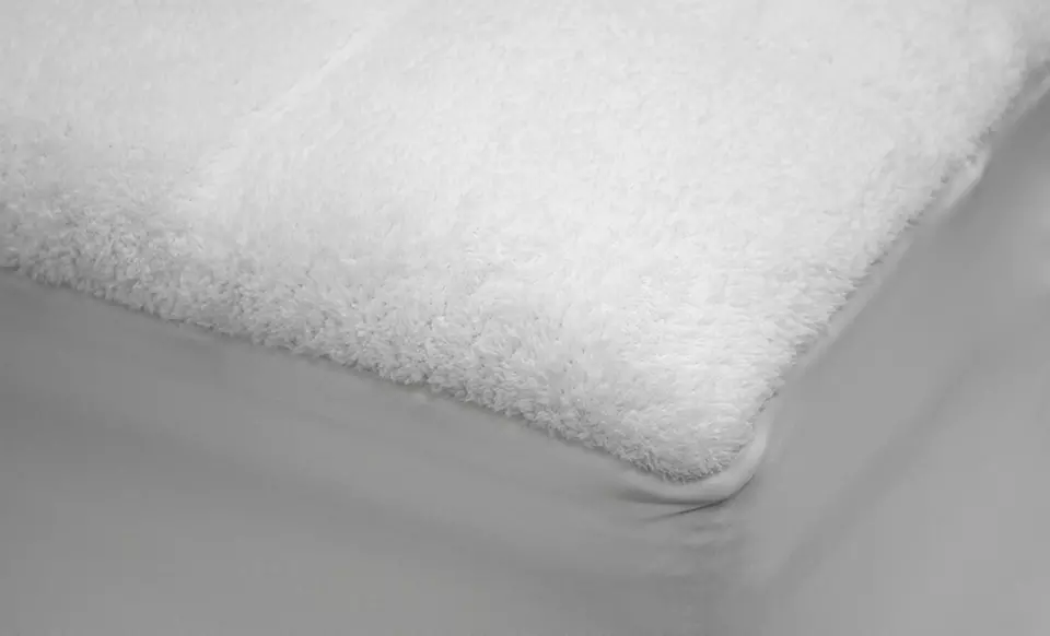 Dream Cloud Microplush Overfilled Mattress Pad. Multiple Sizes Available from $29.99–$39.99.  - Second Medium