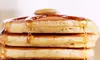 Two Egg & Cheese Sandwich Combos with Coffees or Two Stacks of Pancakes with Coffees at Fatburger (39% Off)