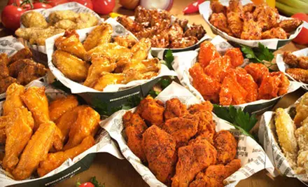 $15 for $30 Worth of Wings, Strips, and Sides at Wingstop - Primary Image