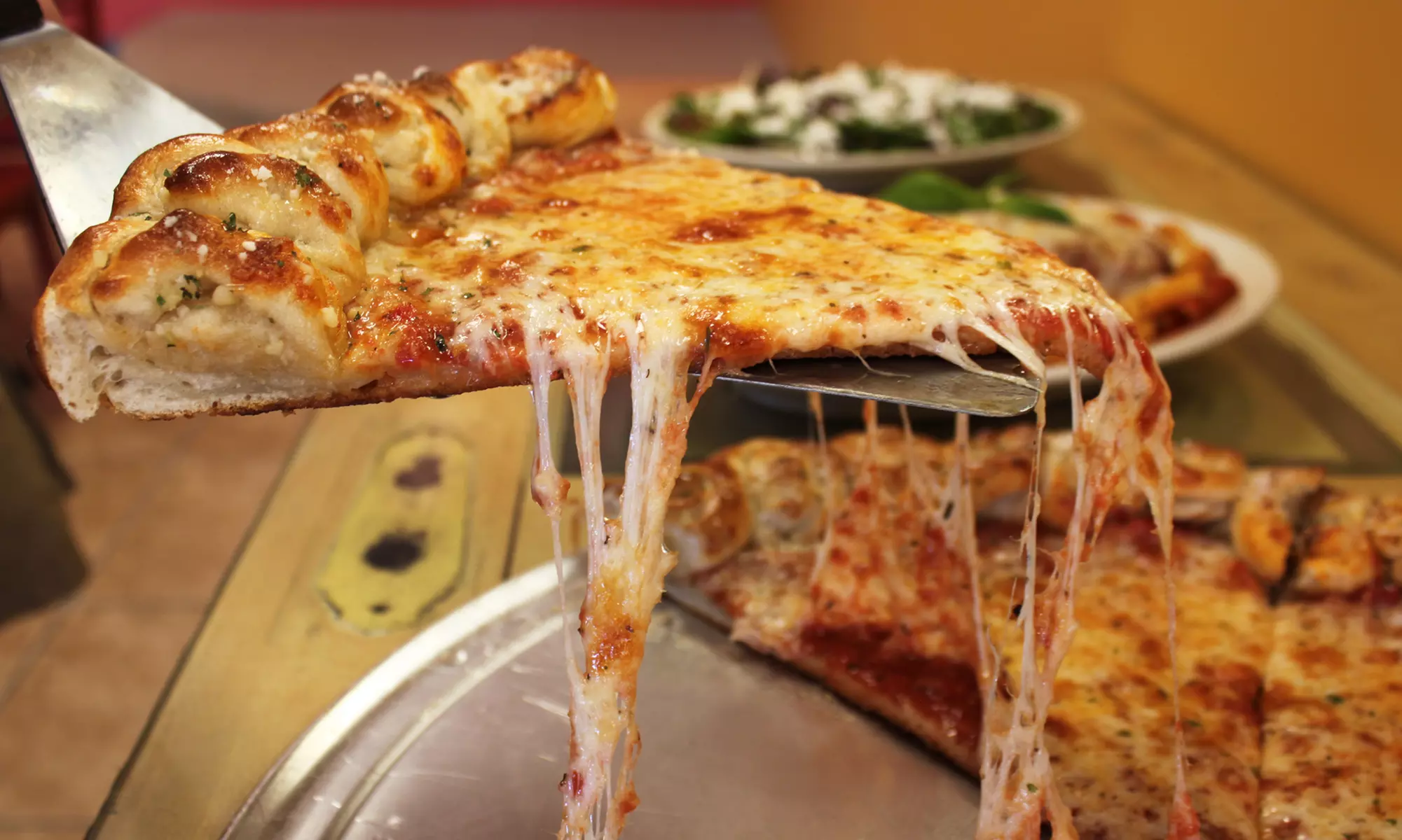 New York Style Pizza, Italian Food, and Heroes at Maglio’s Pizza (Up to 43% Off). Four Options Available. - Primary Image