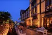 One- or Two-Night St. Louis Mardi Gras Weekend Package with Breakfast, Beads, Drink Tickets, and Late Check-Out - Second Medium