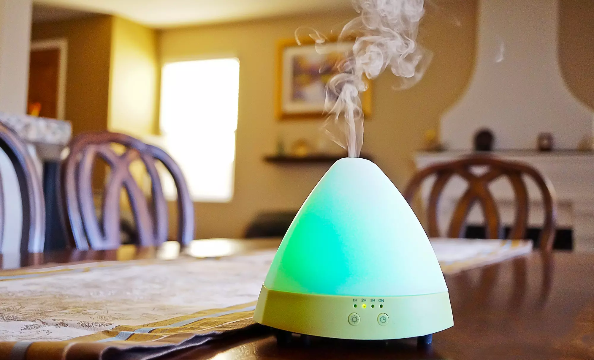 Ultrasonic Aroma Diffuser and Humidifier with Free 10mL Bottle of Therapeutic Essential Oil - Primary Image