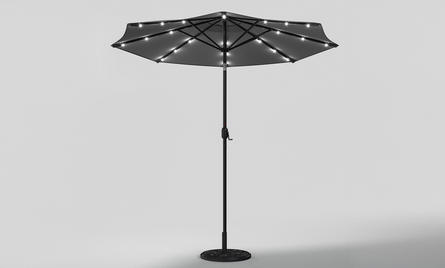 Image 3: Rotatable Solar Lighting Garden Umbrella with Fillable Base