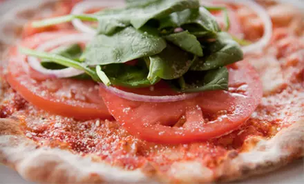 Specialty Pizza, Pasta, and Oven-Baked Sandwiches at Cha Cha Pizza (Half Off). Two Options Available. - Primary Image