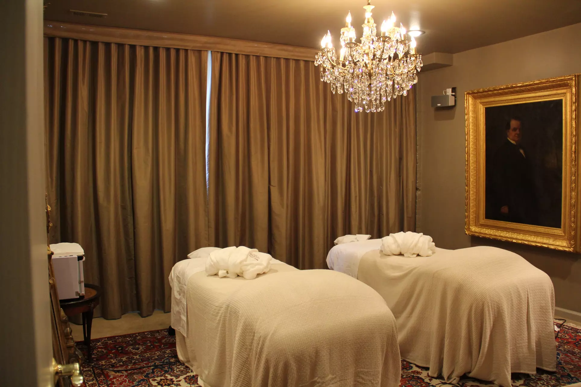 $156 for 60-Minute Couples or Four-Hands Massage with Champagne at Unwind Wellness Center ($210 Value) - Primary Image