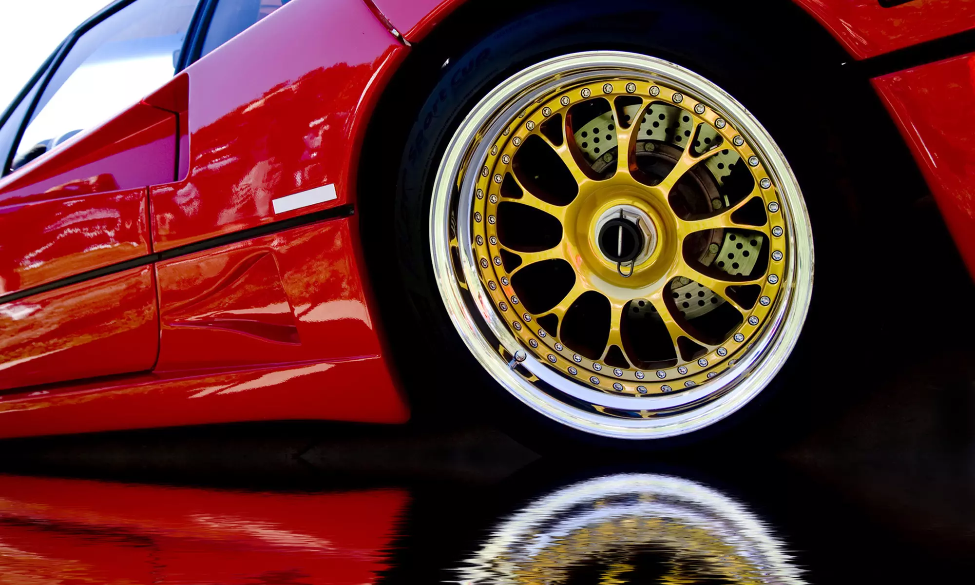 Protective, Colorful Plasti Dip Coating for Four Small or Large Rims at Ottawa Auto Spa (Up to 50% Off) - Primary Image