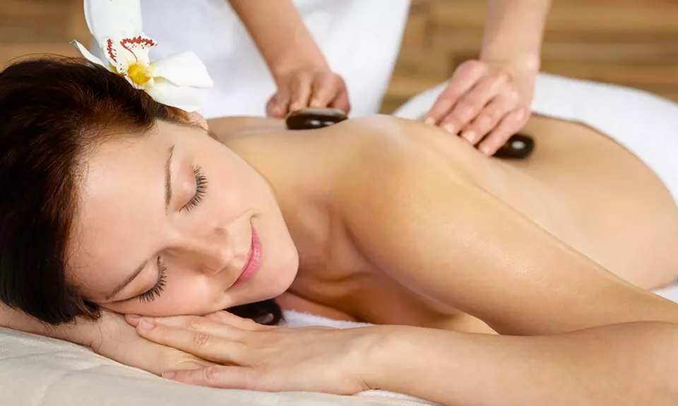 60 or 75-Min Hot Stone or Therapeutic Massage + Cupping at Inner G Restorative & Holistic Care (Up To 28% Off) - Primary Image