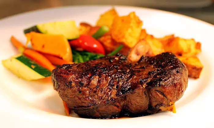 Lunch or Dinner Cuisine for Two at Ric's Lounge & Grill at Four Points Calgary Airport (Up to 42% Off) - Primary Image