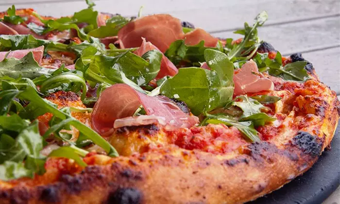 Italian Cuisine at Tartini Pizzeria & Spaghetteria (Up to Half Off). Two Options Available.  - Primary Image