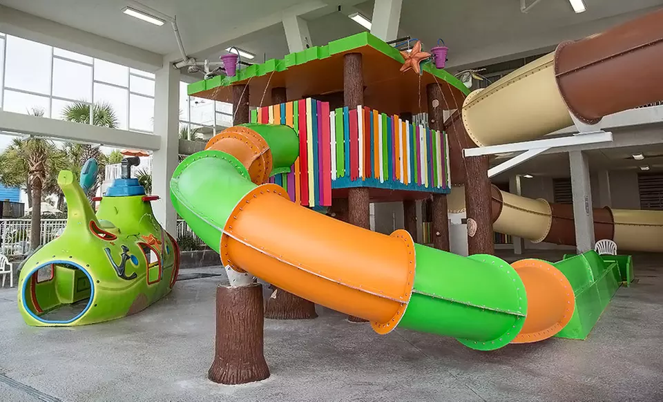 Stay at Crown Reef Beach Resort and Waterpark in Myrtle Beach, SC. Dates Available into June. - Primary Image