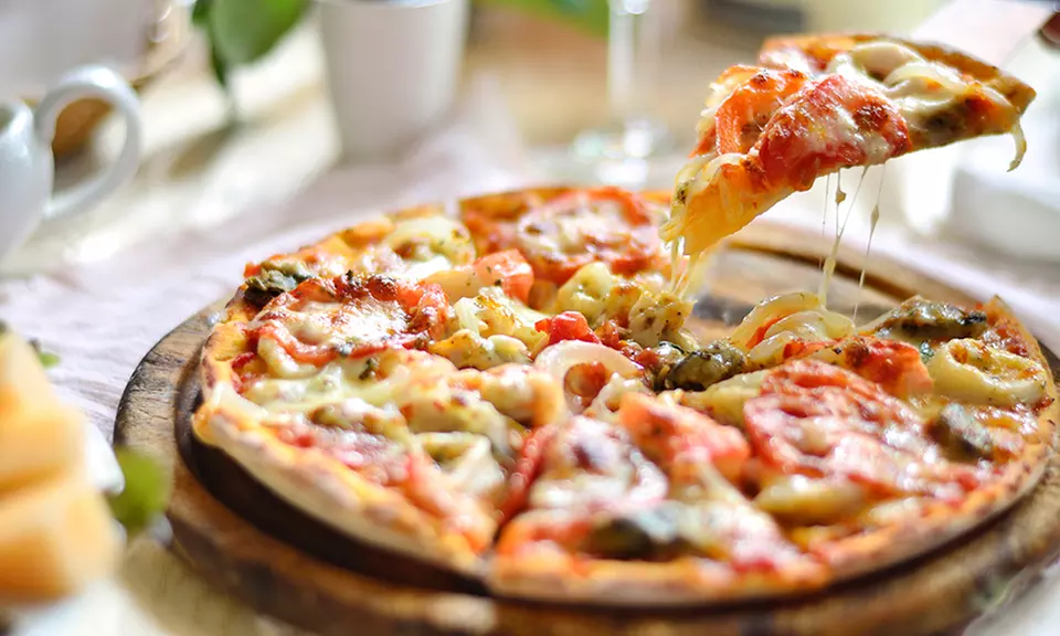 Two or Four Personalized Unlimited-Topping Pizzas at Pieology Pizzeria in Topanga Canyon Boulevard in Los Angeles (33% Off)   - Primary Image