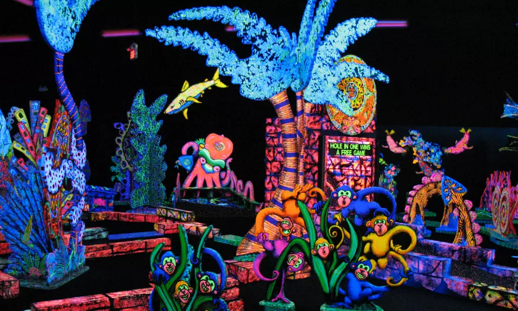 One Round of Glow-in-the-Dark Mini Golf for Two or Four at Putting Edge (Up to 52% Off) - Primary Image