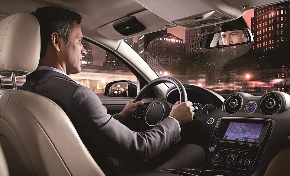 Jabra Freeway In-Car Bluetooth Speakerphone with Voice Guidance, Dual-Microphone Noise Cancellation, and FM Transmitter - Primary Image